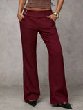 Duna Pantalones modernos de corte amplio en color burdeos, ideales para un look elegante y cómodo.